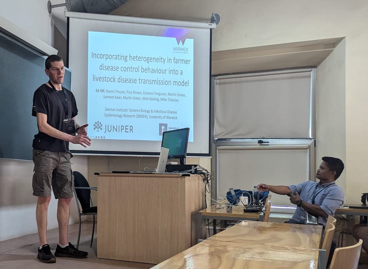 Ed Hill presenting a talk at ECMTB 2024 titled Incorporating heterogeneity in farmer disease control behaviour into a livestock disease transmission model.